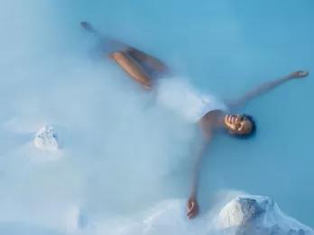 woman-floating-in-pool