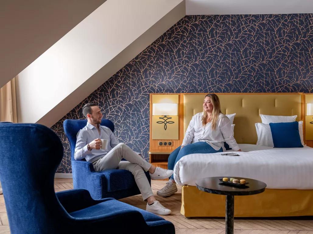 Couple in Junior suite at the Dream Castle Hotel Paris