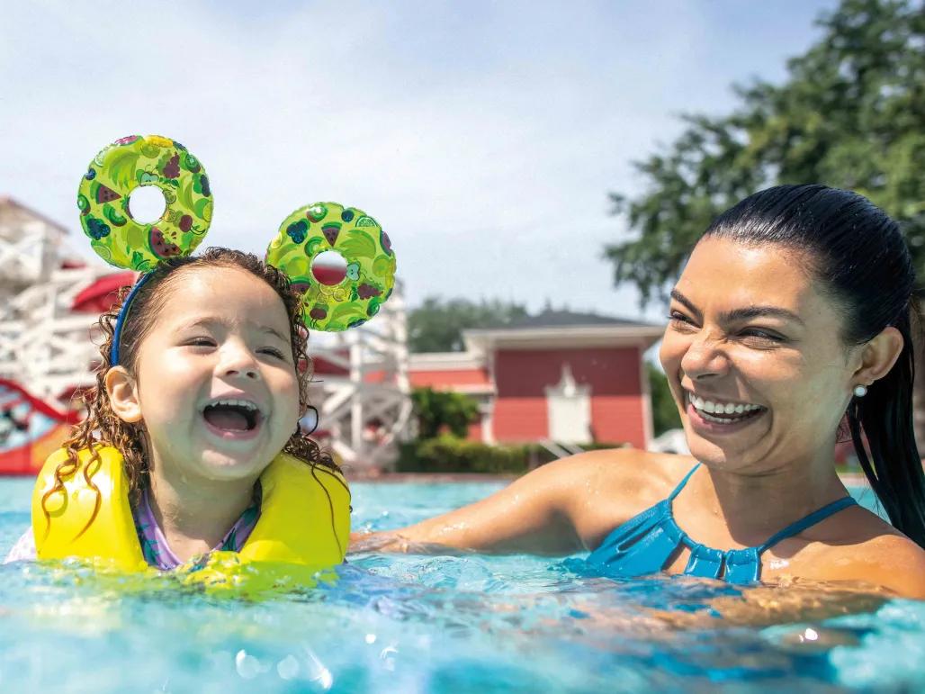 Guests enjoying the pool at Disney's BoardWalk Inn