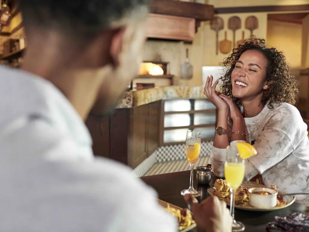 Guests dining at Trattoria al Forno, Disney’s BoardWalk