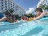 Kids floating on the pool at Universal's Endless Summer Resort – Surfside Inn and Suites