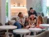 Family sitting in the Dream Castle Hotel Paris Lobby Area