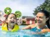 Guests enjoying the pool at Disney's BoardWalk Inn