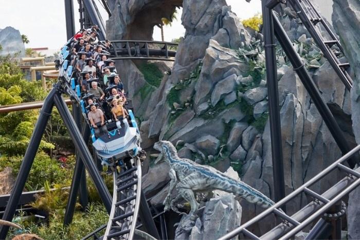 People enjoying a roller coaster