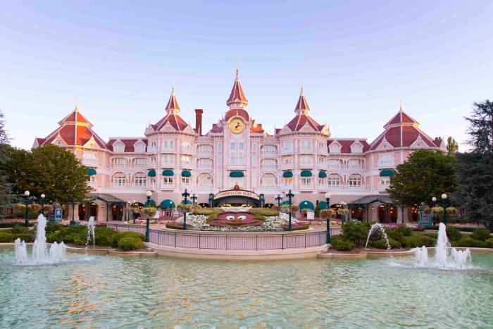 The pink Disneyland Hotel in front of a perfect blue sky