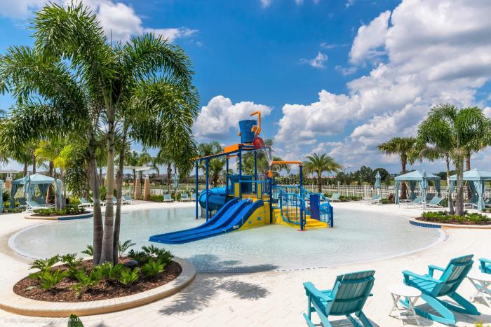 Kids' splash pad with slides and water features at Solara Resort