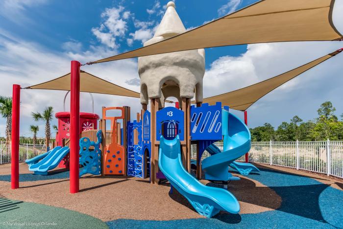 Kids' splash pad with slides and water features at Solara Resort