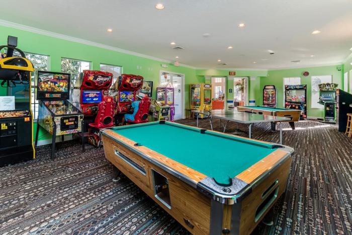 Games Room with a pool table, table tennis and arcade games