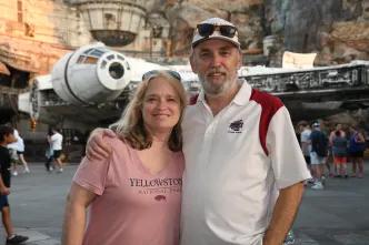 Couple in front of Millennium Falcon