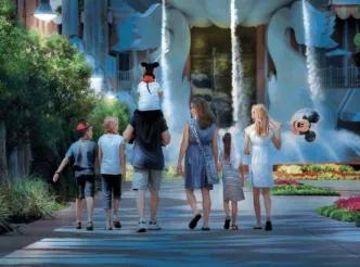 A family walking toward the Swan and Dolphin Resort fountains at Walt Disney World.