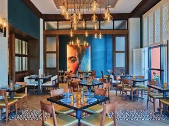 The modern, stylish interior of a restaurant at the Walt Disney World Dolphin Resort