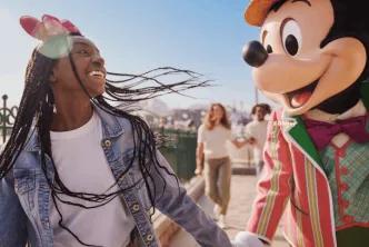 Guest with Mickey Mouse at Disney Adventure World