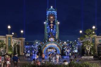 The illuminated entrance portal to Universal Epic Universe at night