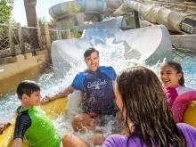 Family riding Tantrum Alley at Wild Wadi Water Park in Dubai