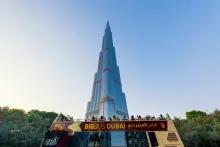 Guests on top of a Big Bus Sightseeing Bus taking photos of Burj Khalifa