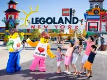 LEGOLAND® New York Resort Tickets Entrance to LEGOLAND® New York Resort showing LEGO characters and an excited family