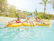 Guests floating on the lazy river at Costa Caribe Water Park, PortAventura World