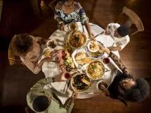 Family eating at Mama Della's Ristorante, Loews Portofino Bay Hotel