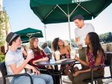 Teens ordering at starbucks, Loews Portofino Bay Hotel