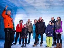 group-exploring-ice-cave