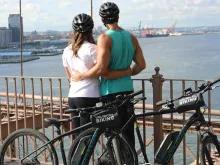 couple-hugging-by-bikes