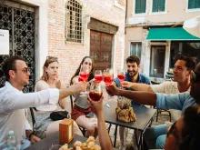 Friends toasting drinks