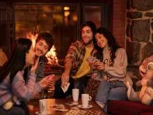 Friends playing games in Redwood lounge