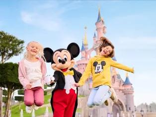 Guests with Mickey at Disneyland Park in Paris