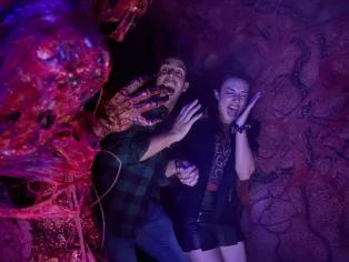Guests in a scare house at Universal Halloween Horror Nights in Orlando