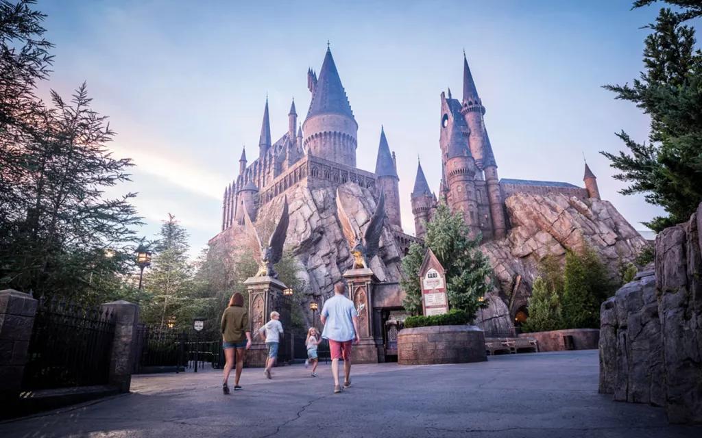 Harry Potter and the Forbidden Journey A family walking towards Hogwarts Castle