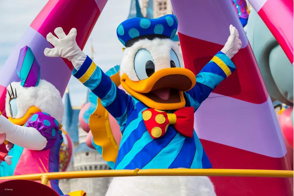 Disney Festival of Fantasy Parade Donald Duck holding his hands up during the Festival of Fantasy Parade