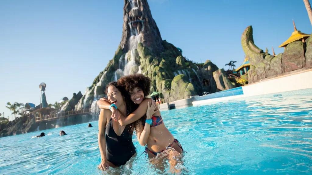 Girls playing in the wave pool at Universal's Volcano Bay