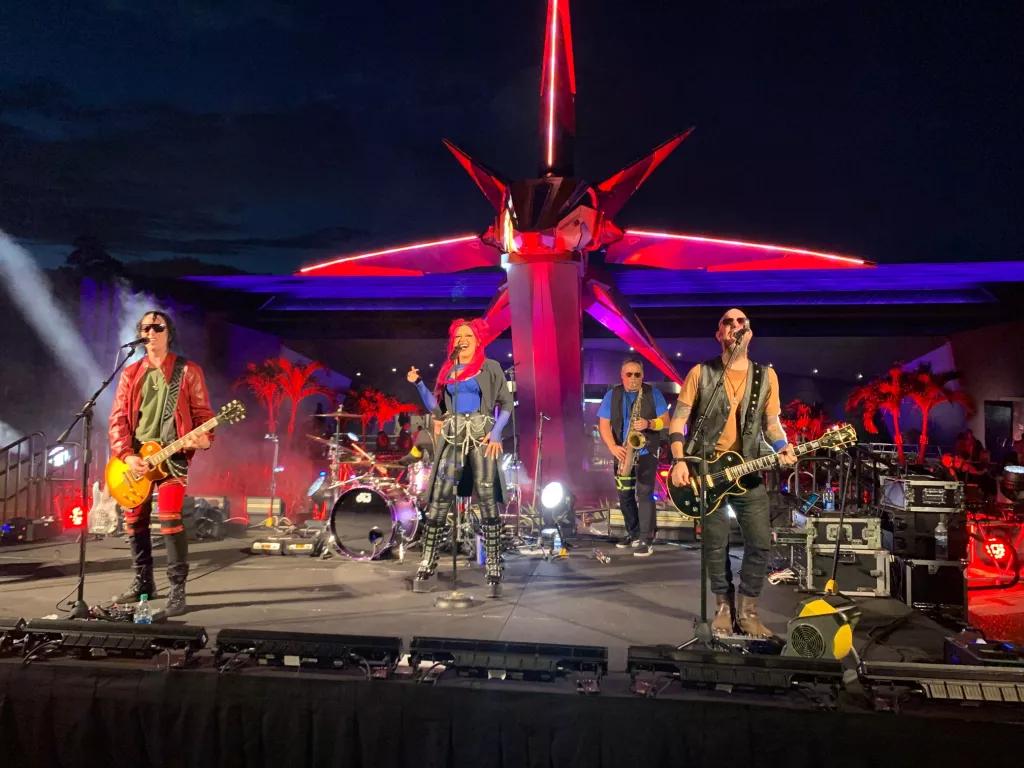 Guardians of the Galaxy: Cosmic Rewind A band performing in front of Guardians of the Galaxy: Cosmic Rewind at night