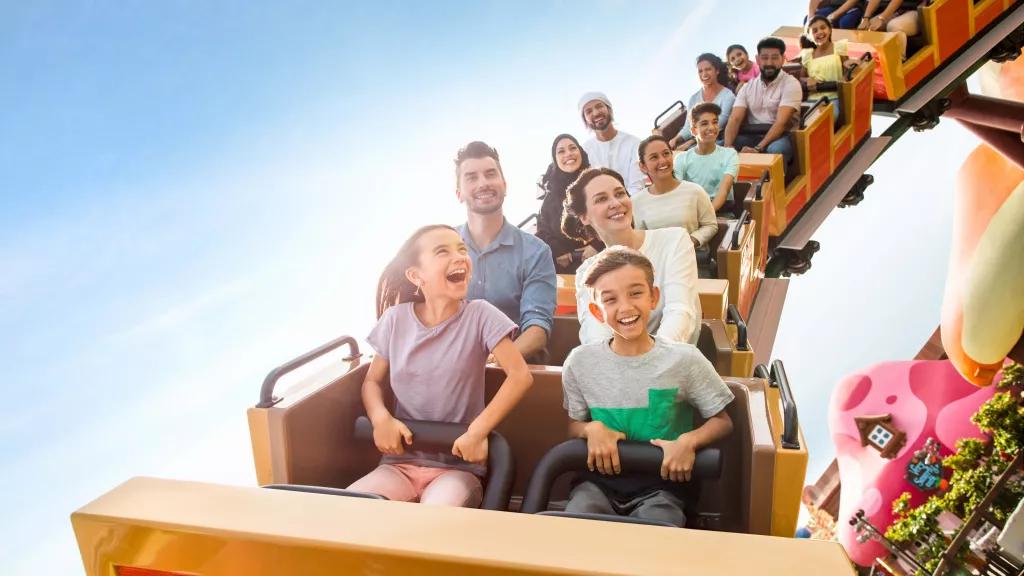 Guests riding the Smurfs Express at Motiongate Dubai