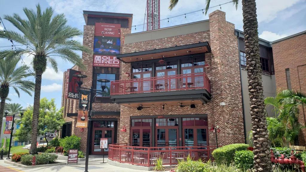 Ole Red Restaurant The exterior of Ole Red restaurant, a red brick building with red metal accents