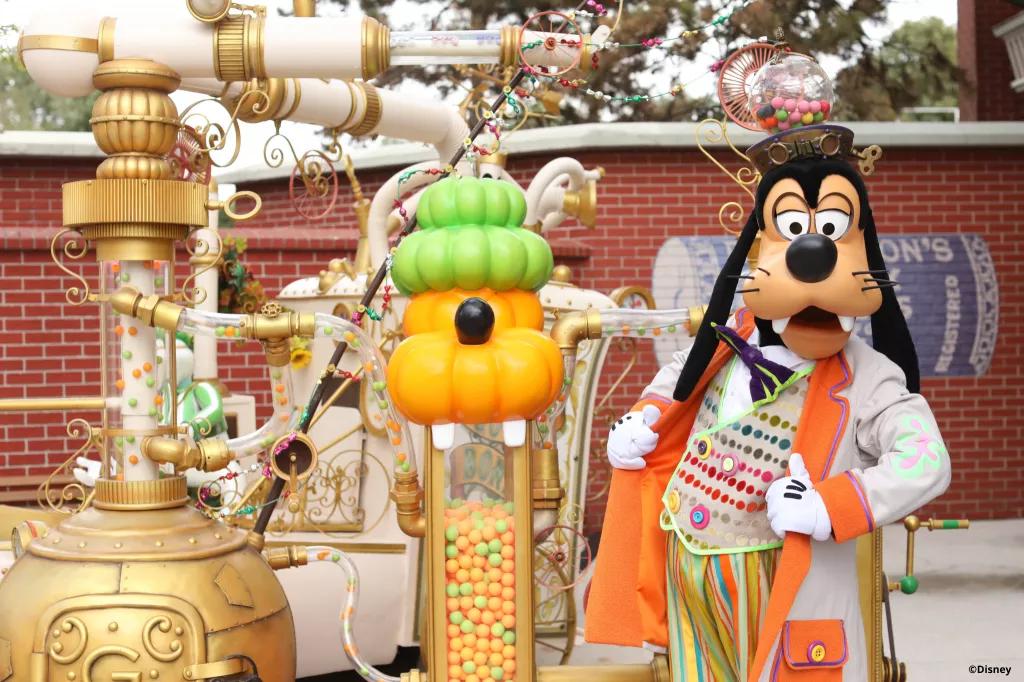 Goofy at Disney's Halloween Festival Goofy in a Halloween outfit standing next to a candy machine