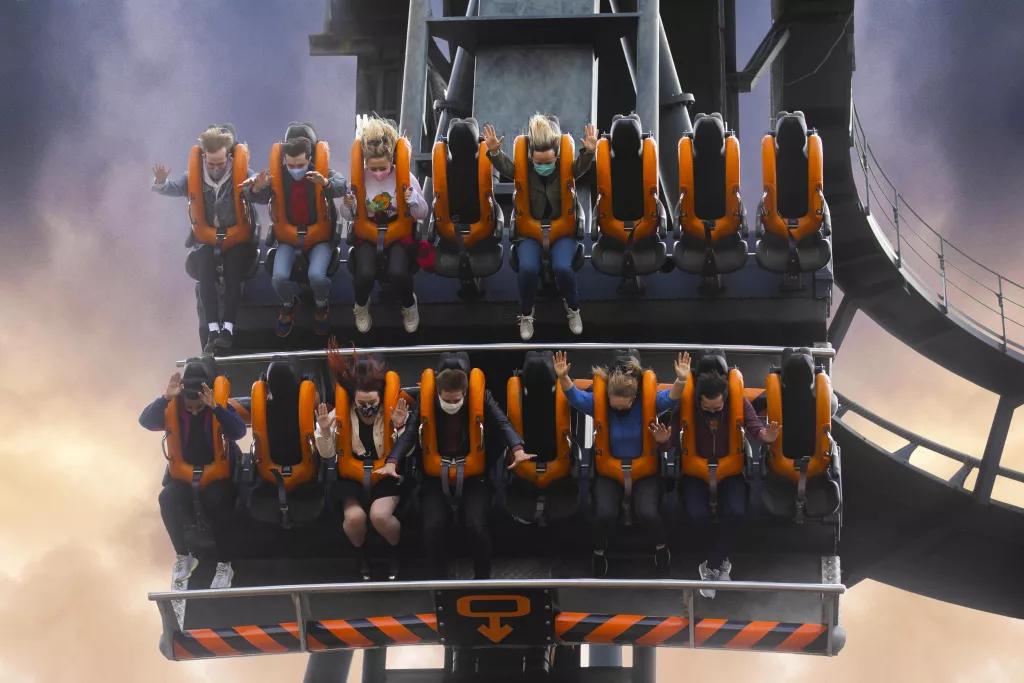 Oblivion Guests on Oblivion facing downwards in a ride vehicle on the 90 degree drop