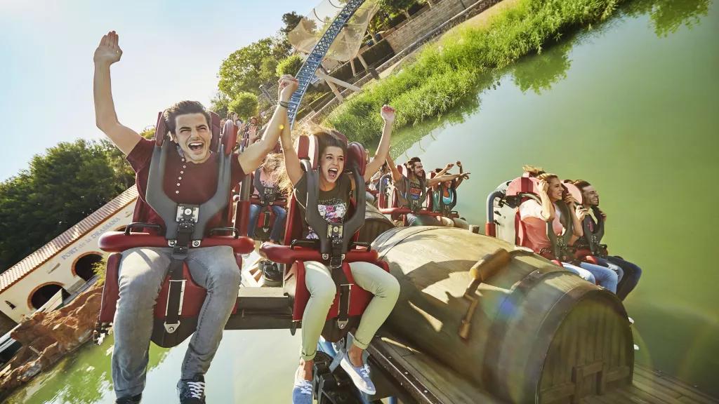 Guests riding Furius Baco at PortAventura theme park