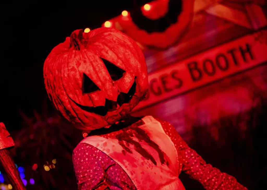 Horrors of Halloween A woman in a bloody apron with a jack-o-lantern head