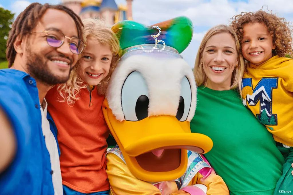 Meeting Characters at Disneyland Paris A family with two children meeting Donald Duck in front of Sleeping Beauty Castle