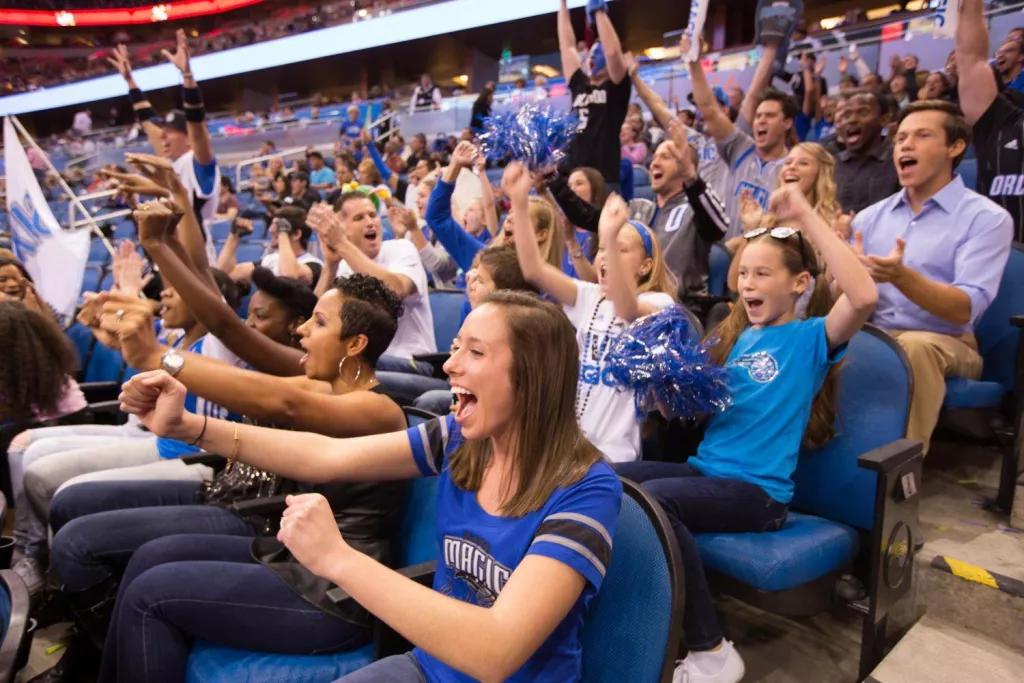 Orlando Magic Fans Orlando Magic fans in their seats cheering for the players
