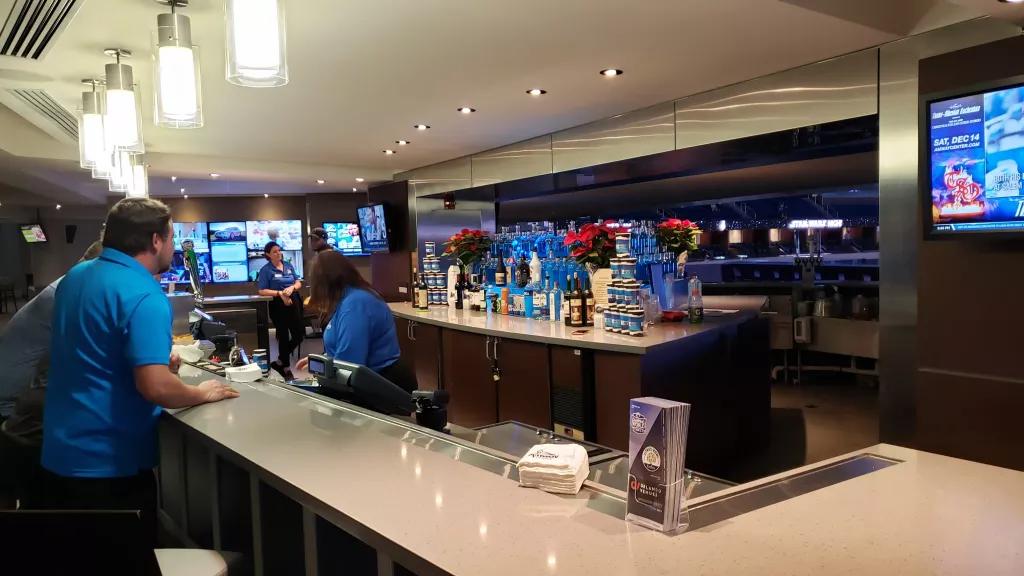 Bars and Restaurants at the Amway Center One of the bars at the Amway Center looking out over the basketball court