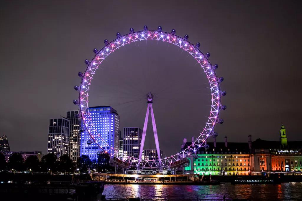 The London Eye at Christmas The London Eye at night lit up with red and blue lights