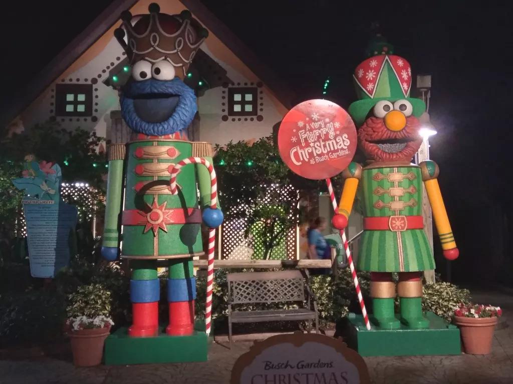 Sesame Street Safari of Fun Statues of Elmo and Cookie Monster dressed as Christmas nutcrackers