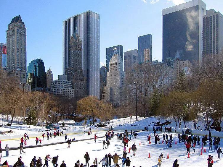 Ice Skating in Central Park Looking down over the Woolman Ice Skating Rink in Central Park with skyscrapers in the background