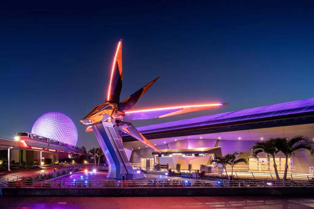 Guardians of the Galaxy: Cosmic Rewind The exterior of Guardians of the Galaxy: Cosmic Rewind, with a large spaceship in front of Spaceship Earth and a monorail