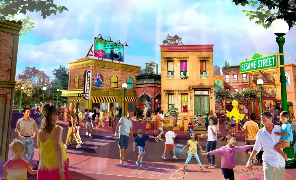 Sesame Street Land at SeaWorld Orlando Concept art of Sesame Street Land with lots of families walking through a cartoon style New York street