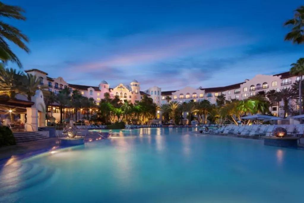 Hard Rock Hotel Pool A large pool in front of a hotel in the evening