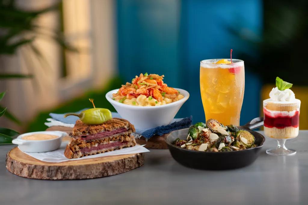 All-American Market Plates of food including a Reuben sandwich, lobster mac and cheese and strawberry shortcake