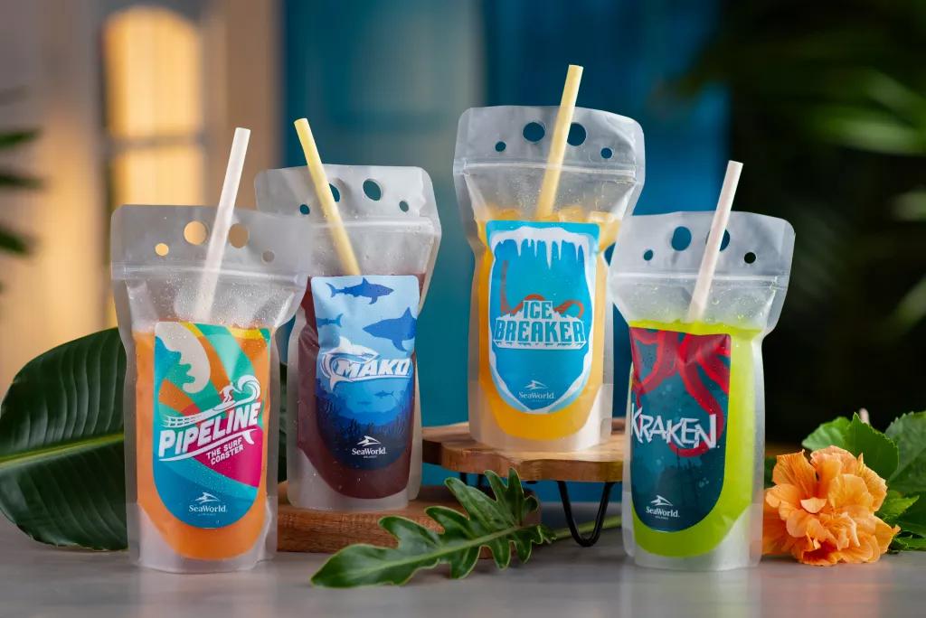 Coaster Cocktails 4 clear plastic pouches with straws filled with cocktails